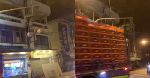 讀者投稿》里港號誌遭大貨車擦肩而過 紅綠燈懸浮在空中